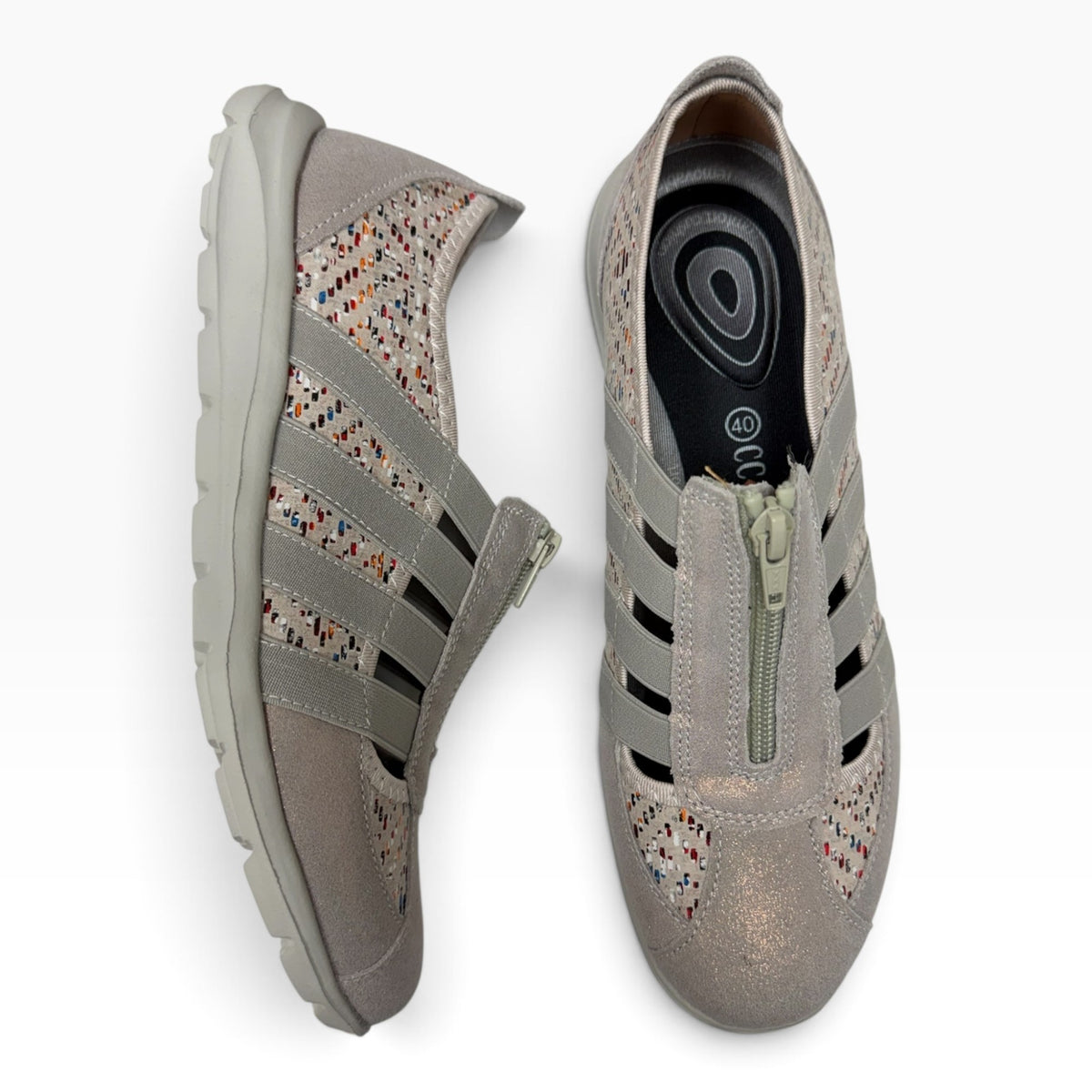 The Shoe Shop Christine women's beige leather sneakers with a central zipper, multi-colored accents, and rubber sole.