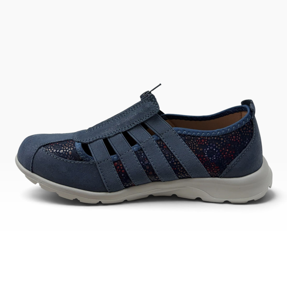 The Shoe Shop Christine blue leather slip-on shoe with side cutouts, central zipper, and durable rubber sole.
