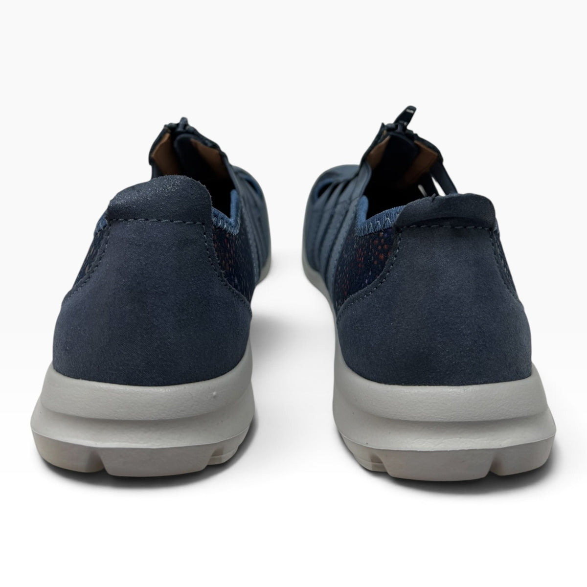 The Shoe Shop Christine navy blue leather slip-on shoes with a durable rubber sole, viewed from the back.
