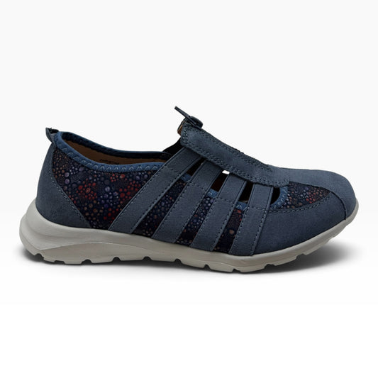 The Shoe Shop Christine navy leather slip-on shoe with patterned side panels, central zipper, and rubber sole.