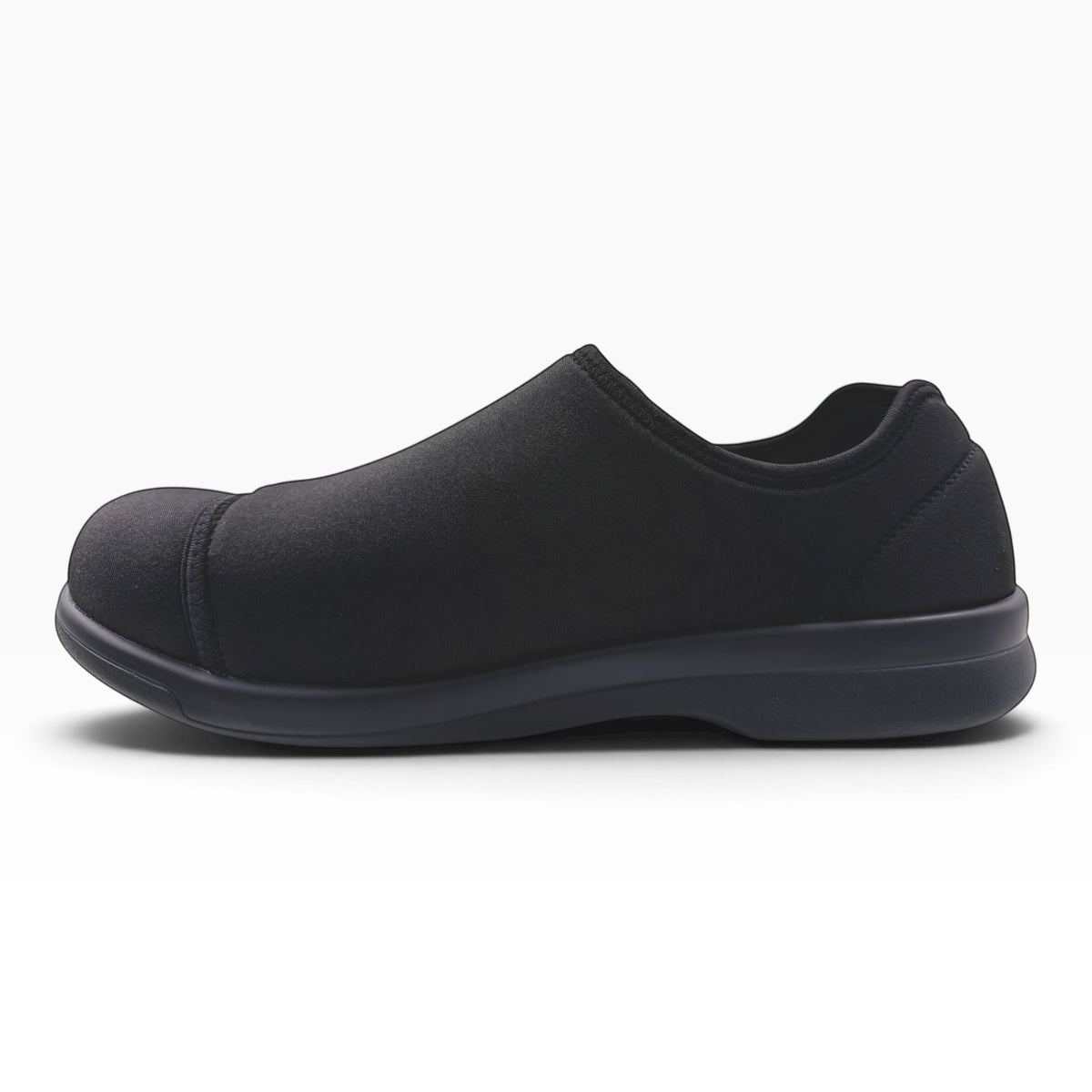 The Shoe Shop Cush n Foot black neoprene slipper with a durable PU outsole and adjustable hook-and-loop strap.