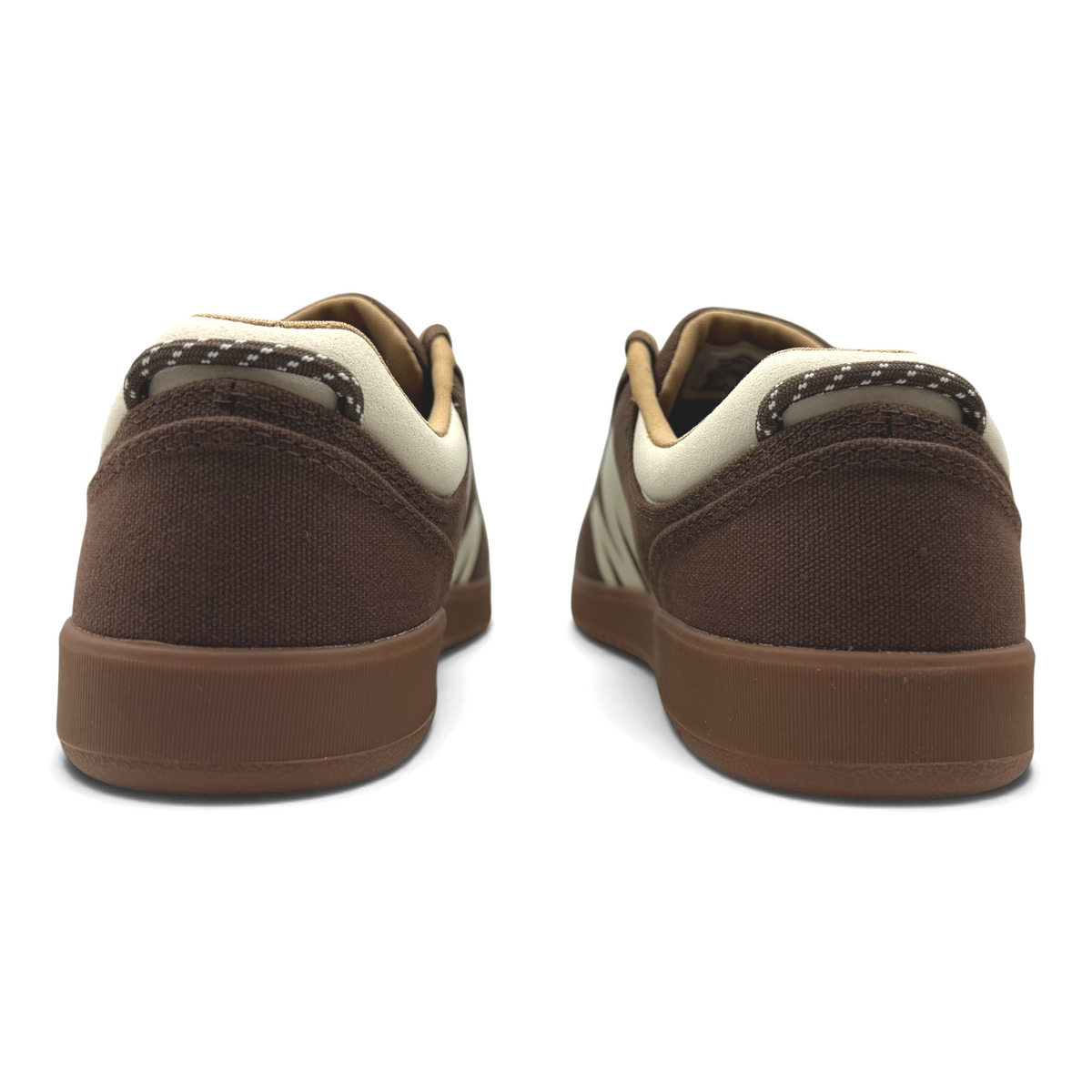 Rear view of The Shoe Shop Cygnet Canvas mens sneakers in earthen brown with beige trim and textured rubber soles.