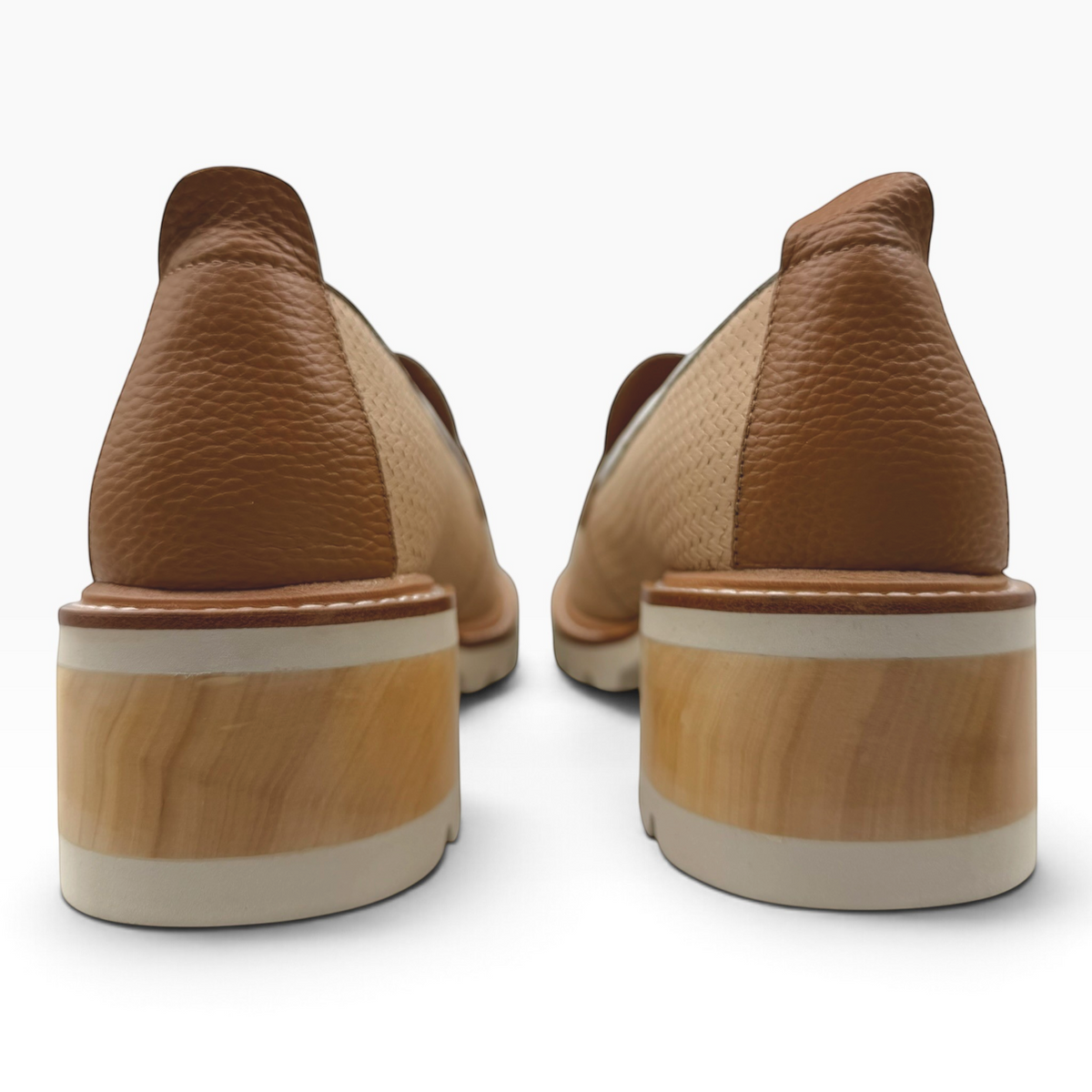 The Shoe Shop Delmira loafer featuring a tan textured upper and a distinctive light wood-effect block heel