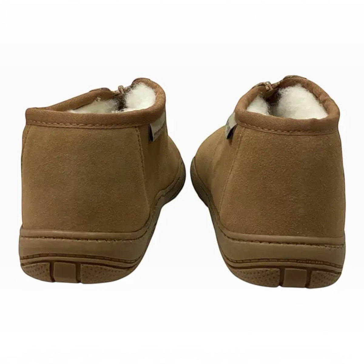 The Shoe Shop Dobson slippers in tan leather with plush white wool lining and durable TPR soles, rear view