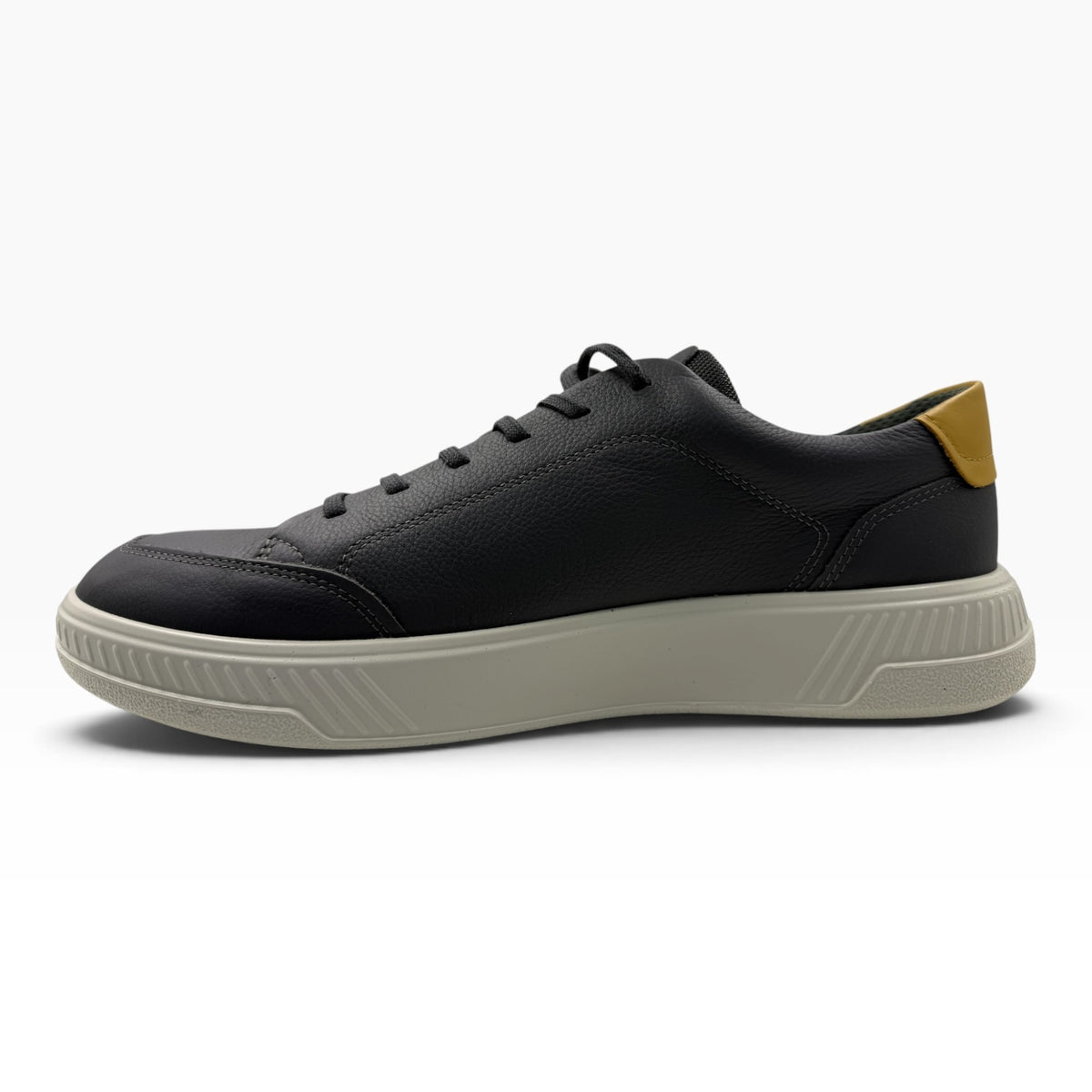 The Shoe Shop Ecco 551604 black leather sneaker with a thick beige platform sole and mustard yellow heel tab