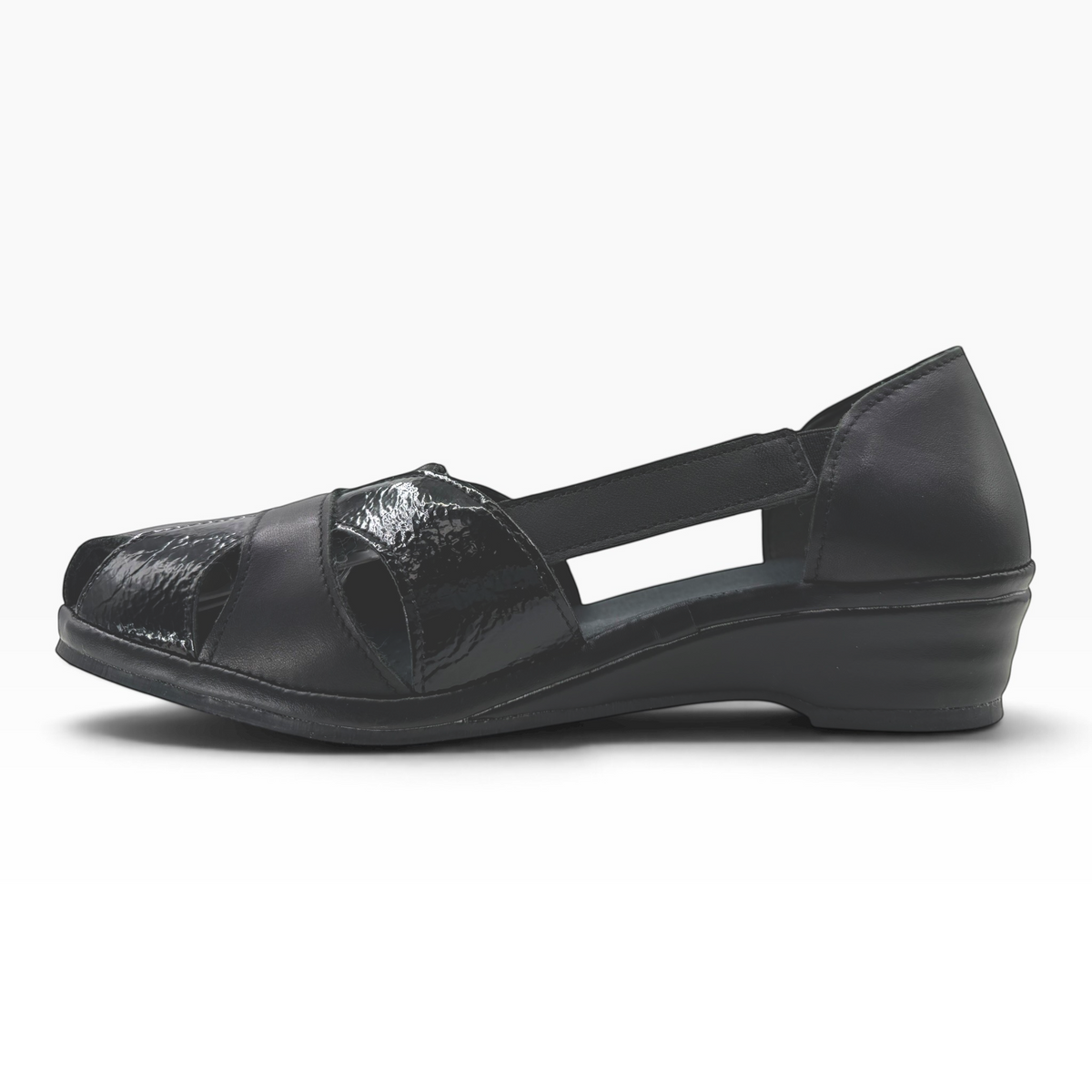 The Shoe Shop Elson black leather peep-toe flat with patent detailing, side cut-outs, and a low wedge sole.
