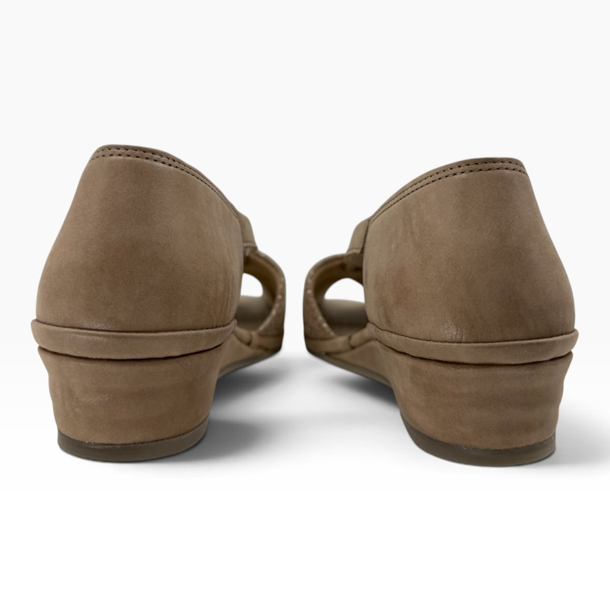The Shoe Shop Emerald tan suede flat sandals featuring a low wedge heel and back view on a white background.