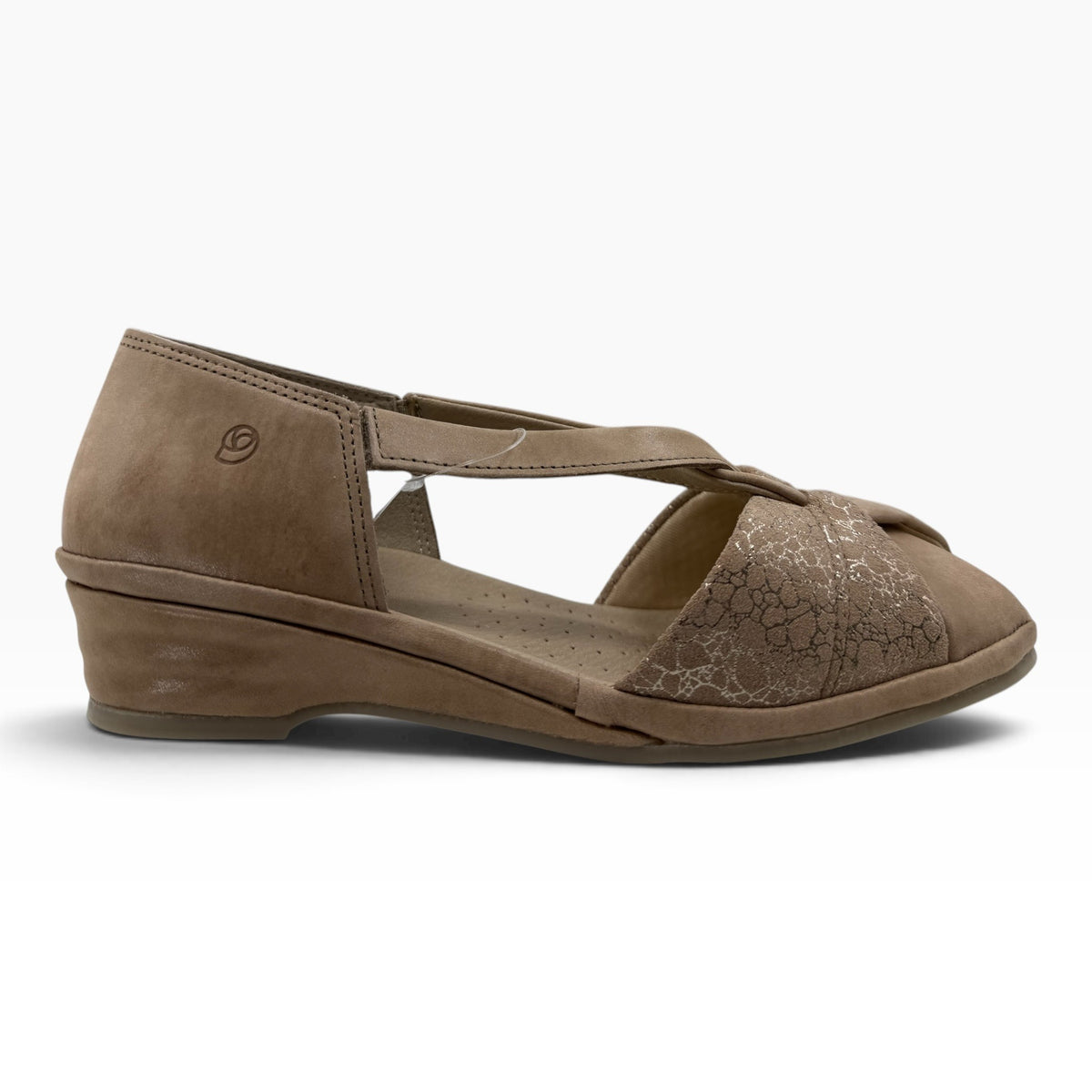 The Shoe Shop Emerald flat suede sandal in taupe with crossed straps, cut-out sides, and a low wedge heel.