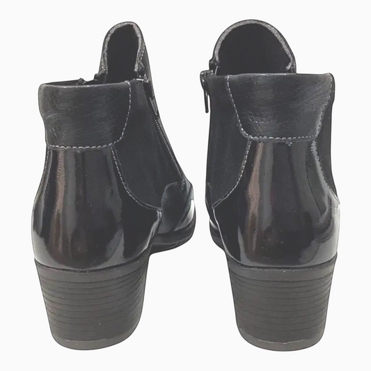 The Shoe Shop Emmi black ankle boots featuring a mix of smooth leather, suede, and patent heel detail with block heel.