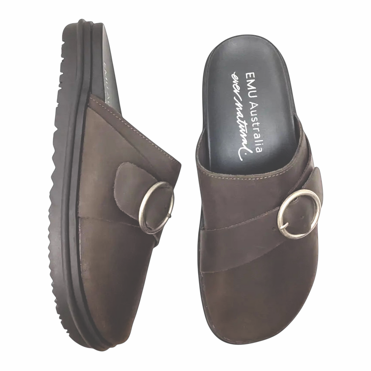 The Shoe Shop EMU Amber 2.0 espresso brown leather slip-on mules with a silver buckle and rubber sole.
