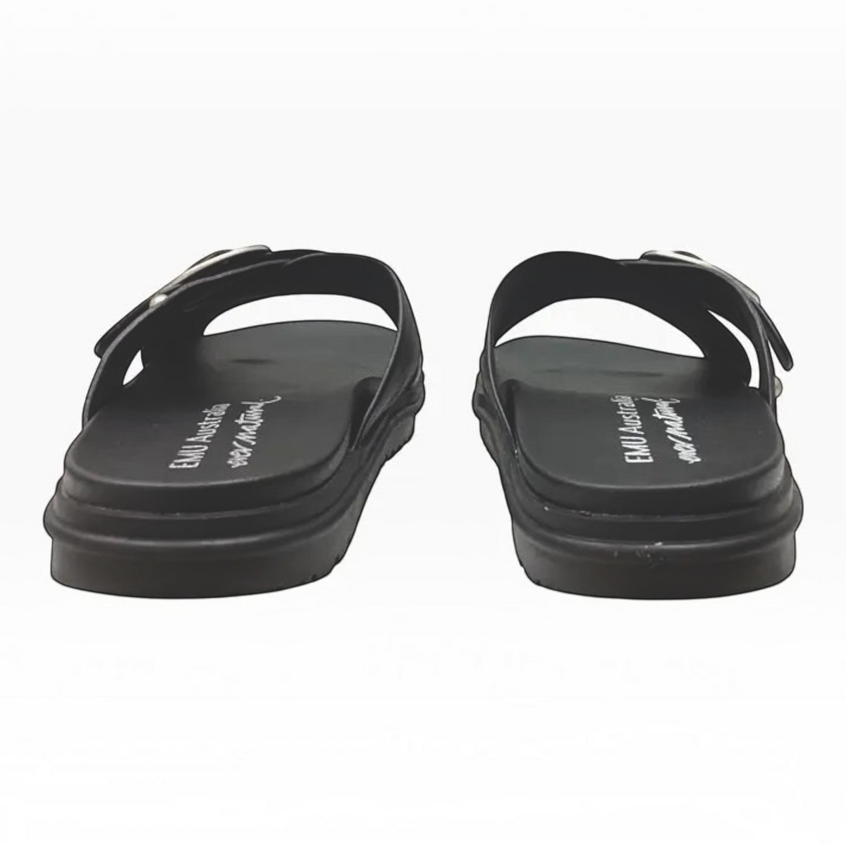 The Shoe Shop EMU Ebony black leather slide sandals with criss-cross straps and silver buckles, rear view.