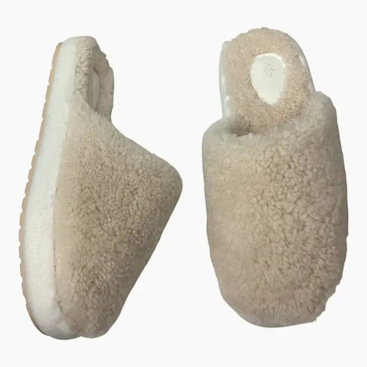 The Shoe Shop EMU Starley beige sheepskin slippers with plush teddy wool texture and a flexible sole.