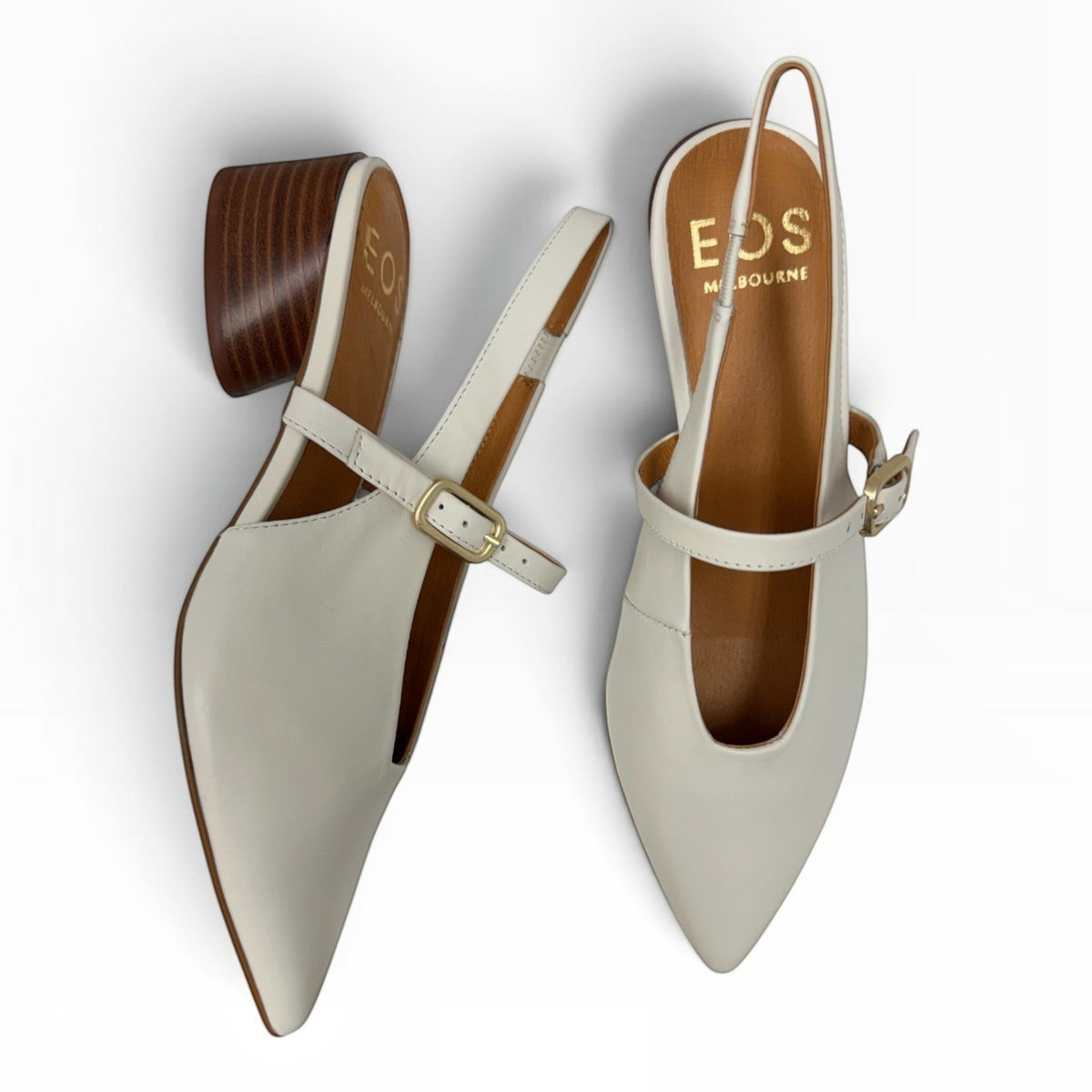 The Shoe Shop EOS Hattis cream leather slingback heels with a pointed toe and low wooden block heel.