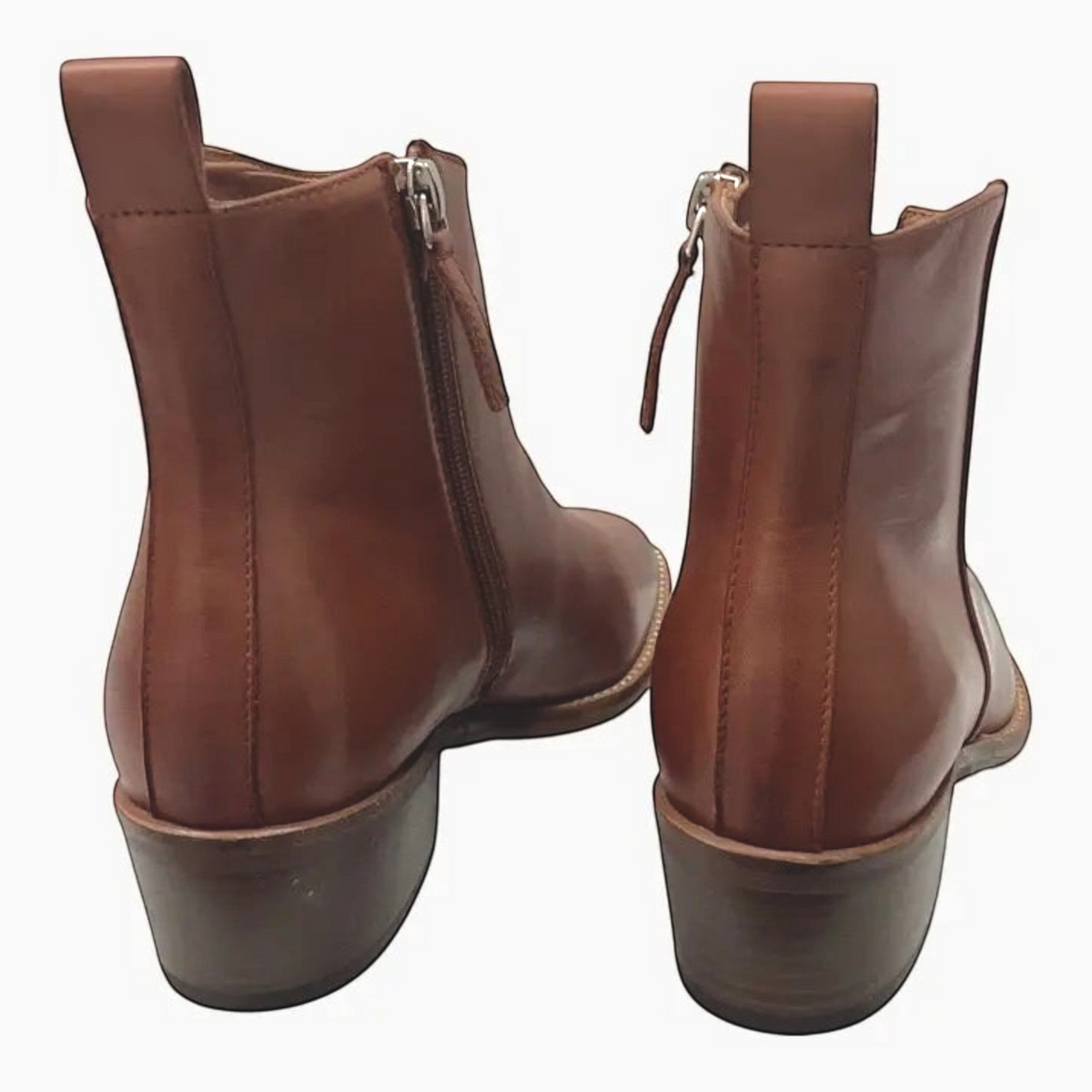 The Shoe Shop EOS Ilan brandy leather ankle boots featuring a low stacked heel, inner zip, and back pull tab.