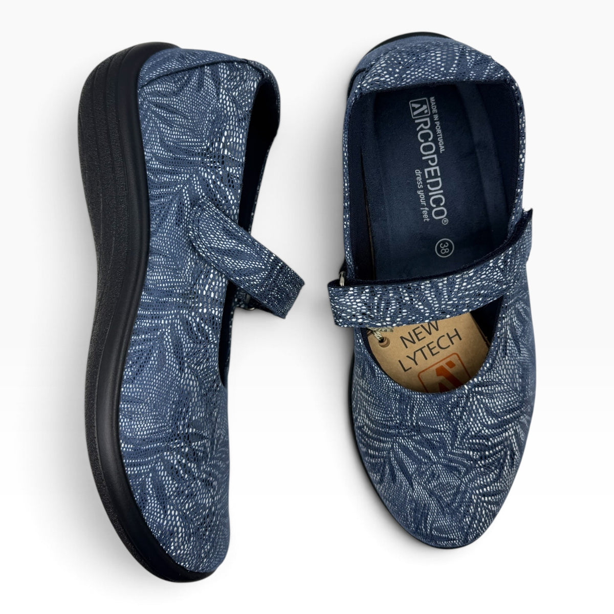 The Shoe Shop Estrela Mary-Jane flat in blue Lytech with a white palm tree pattern and adjustable instep strap.