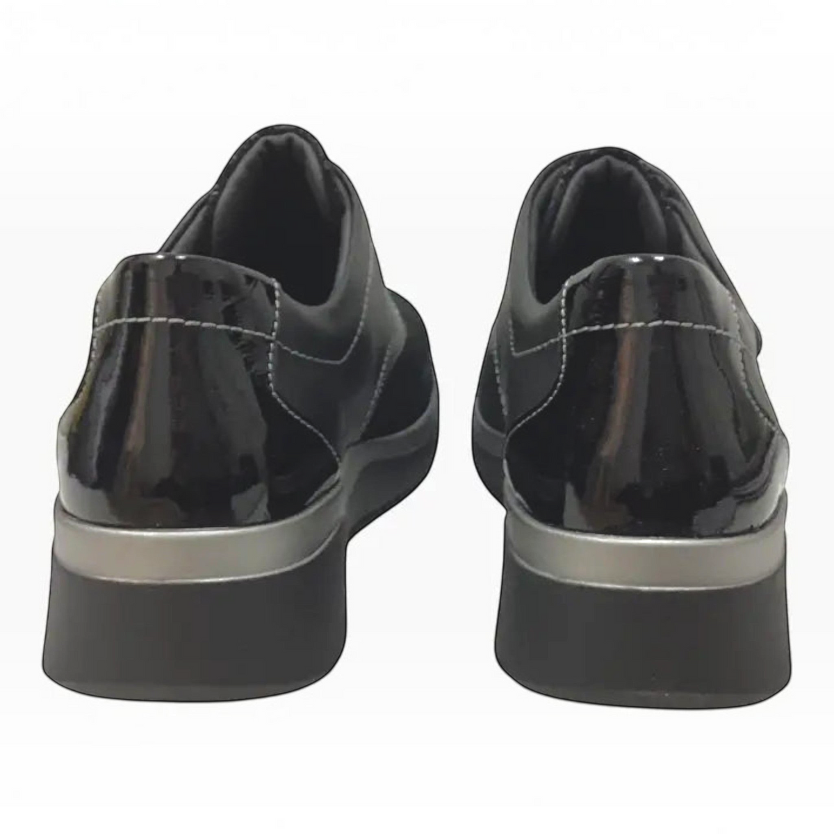 The Shoe Shop Ezra black leather shoes with patent detailing and a supportive low wedge heel, rear view