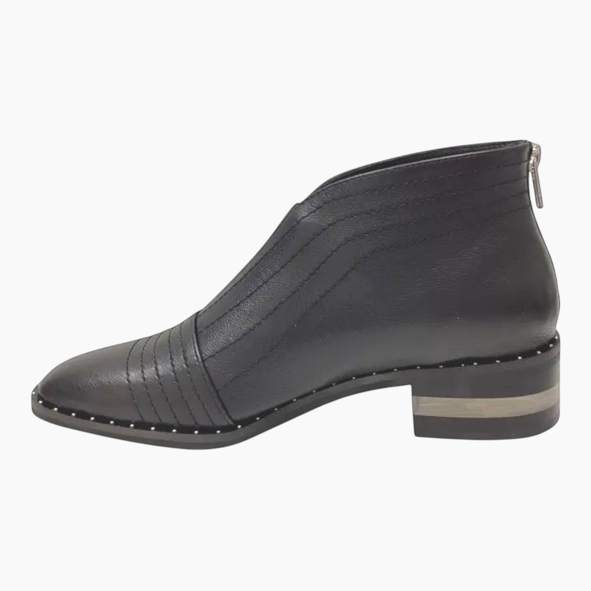 The Shoe Shop Faradays black leather ankle boot with a low block heel, side zipper, and decorative stitching.