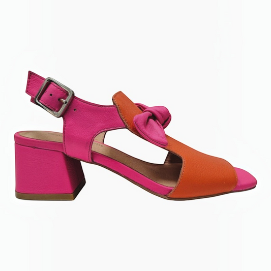 The Shoe Shop Felia leather block heel sandal in vibrant pink and orange with a bow detail and adjustable ankle strap.