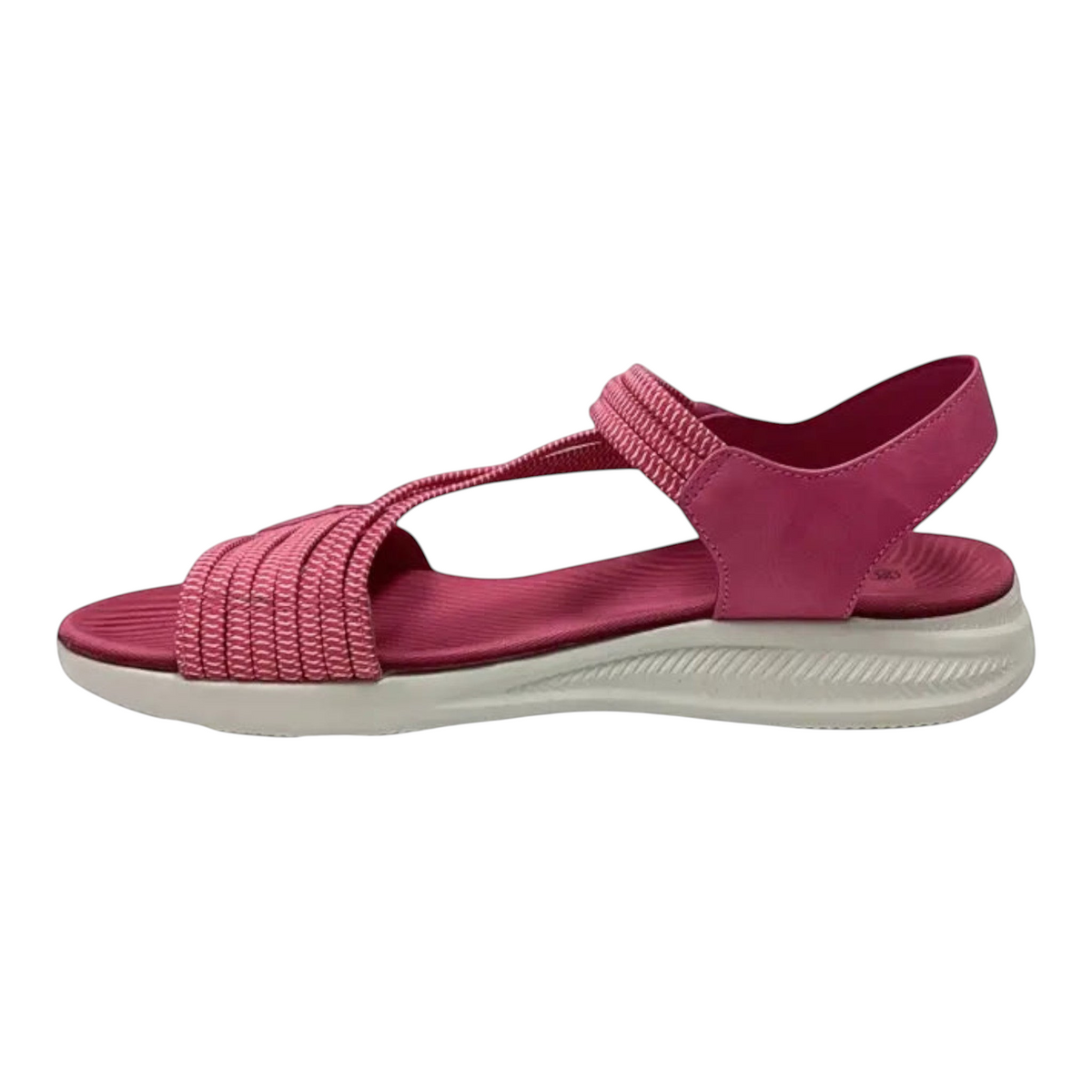 The Shoe Shop Florrie sandal in vibrant pink with woven strap detailing and a comfortable white cushioned sole.