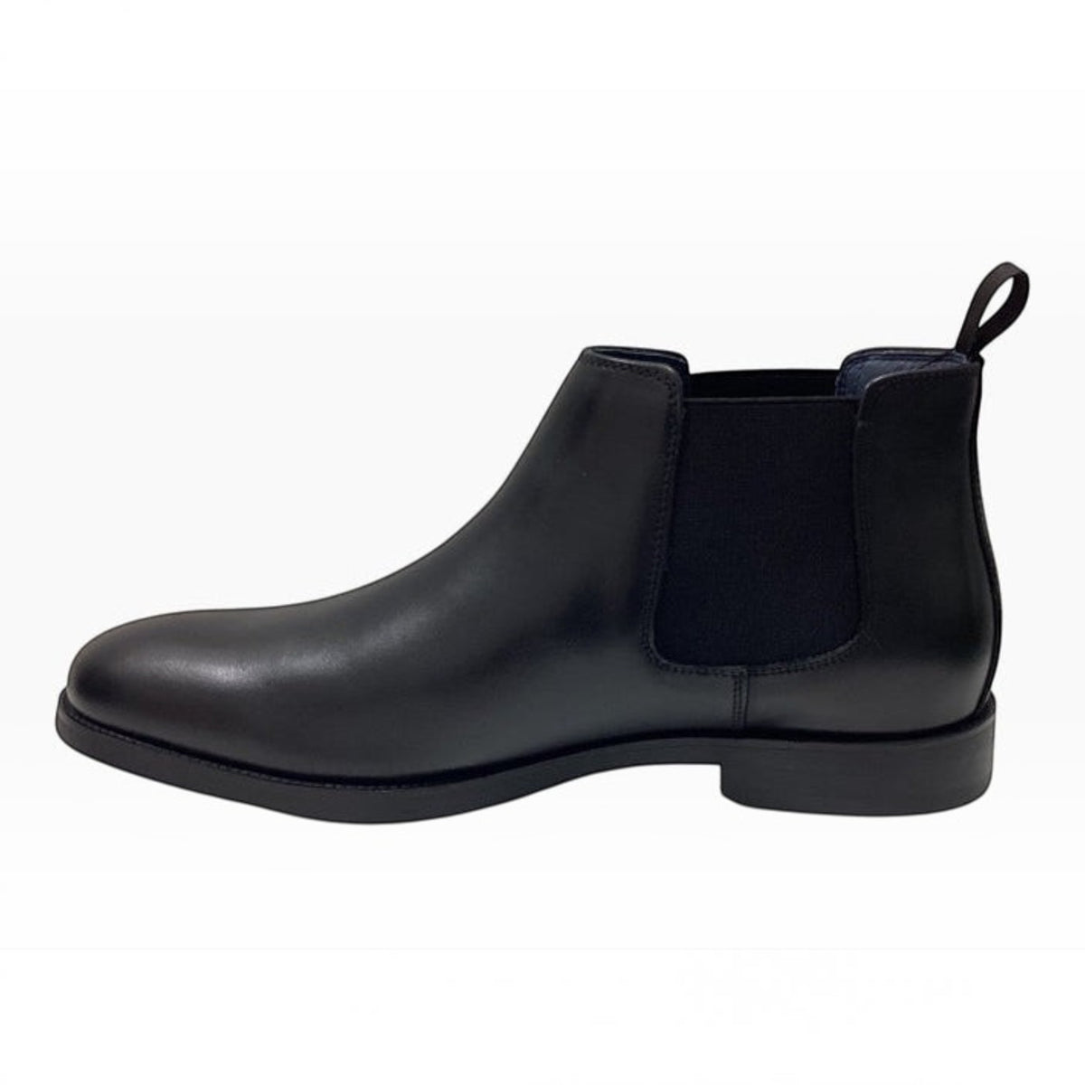 The Shoe Shop Florsheim black leather Chelsea boot with elastic side panels and a pull tab in a side profile view.