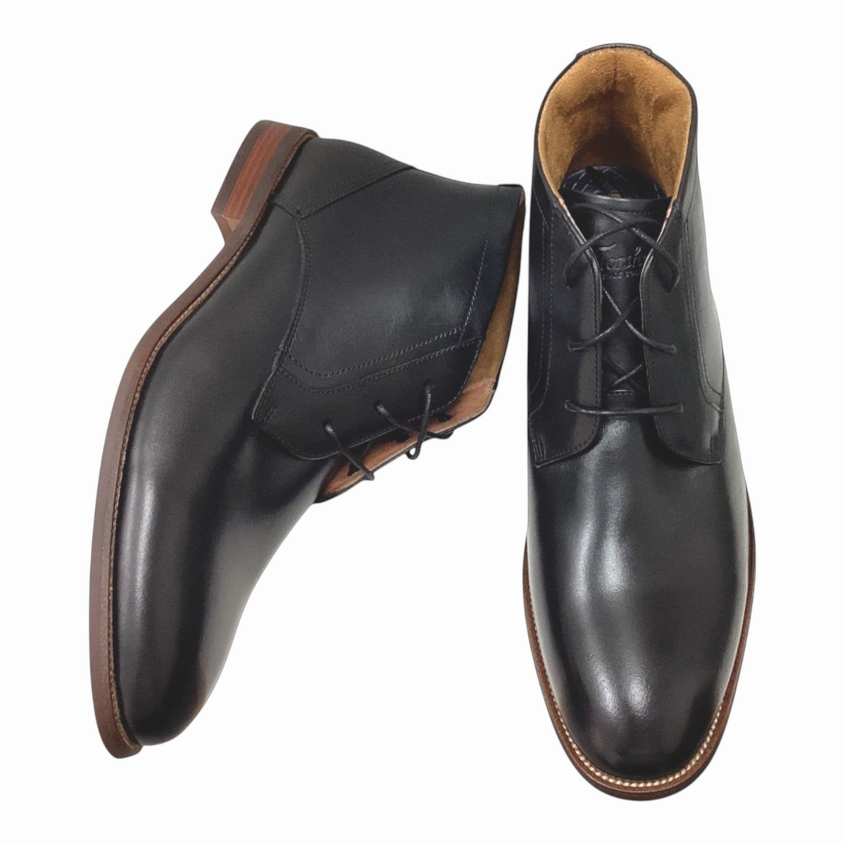 The Shoe Shop Florsheim Rucci black full grain leather chukka boots with three-eyelet lace-up and stitched welt sole.