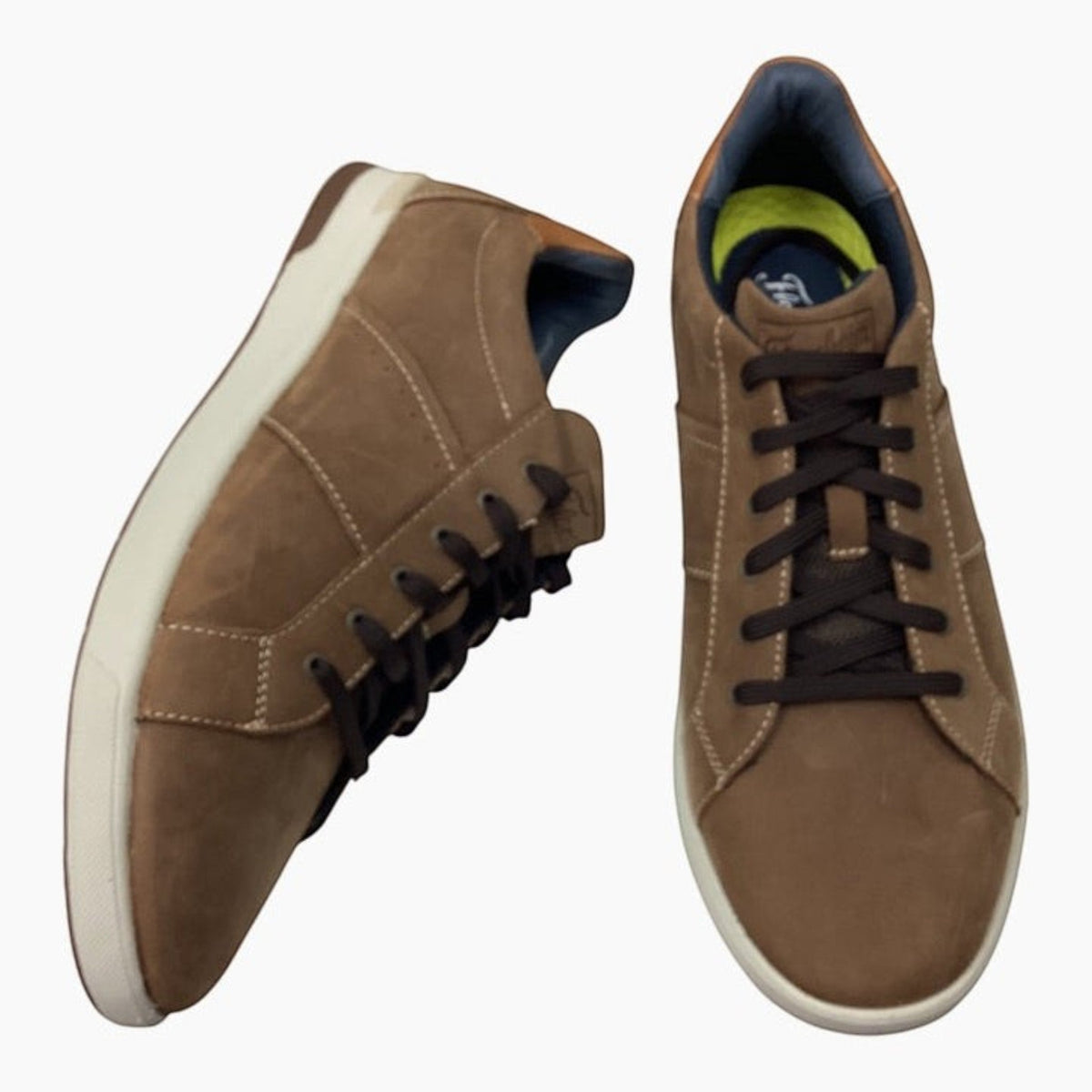 The Shoe Shop Florsheim Crossover brown leather lace-up sneakers with a white rubber sole and cushioned footbed.