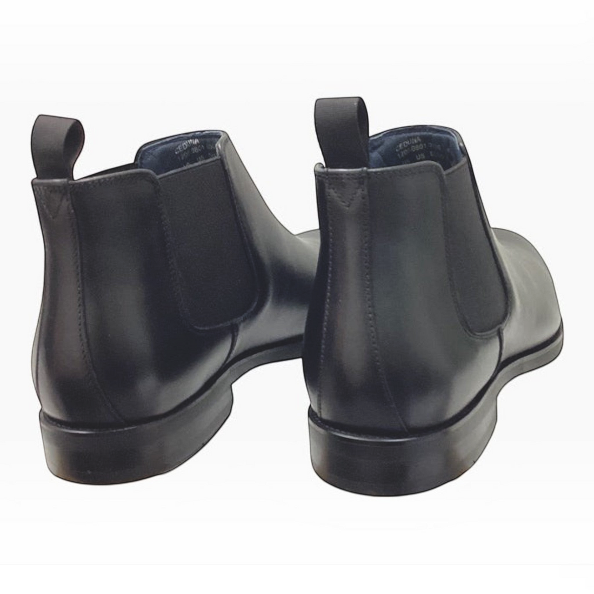 The Shoe Shop Florsheim Ceduna black leather Chelsea boots featuring a rear view with pull tabs and elastic gussets.
