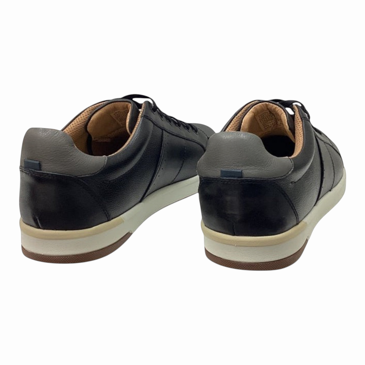 The Shoe Shop Florsheim Crossover lace-up sneakers in black leather with a white midsole and brown rubber outsole.