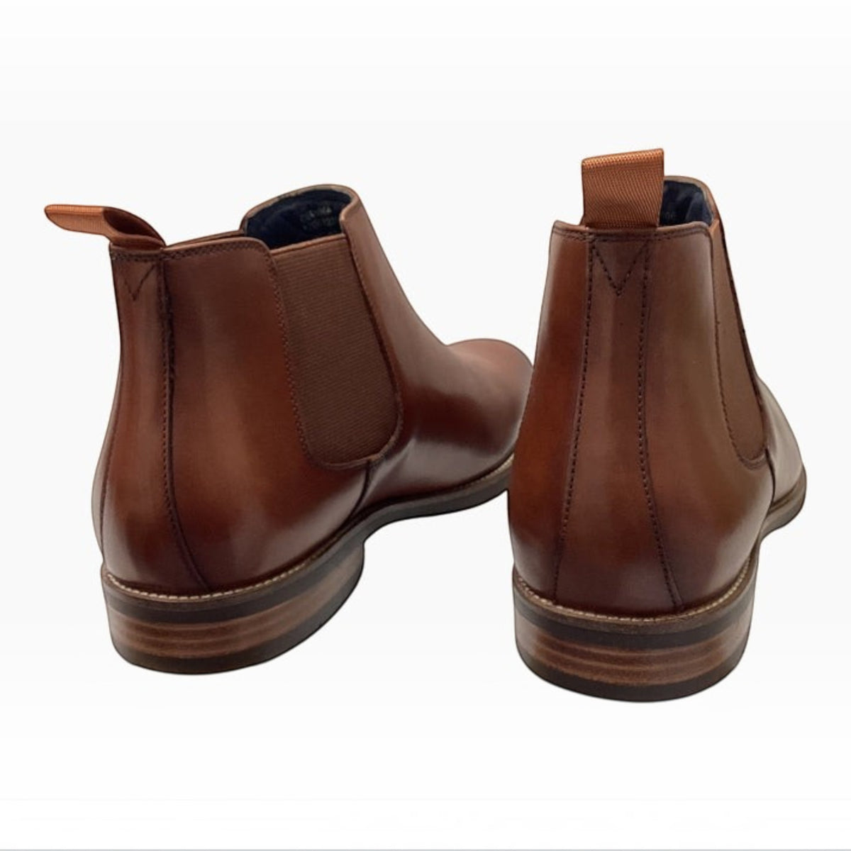 The Shoe Shop Florsheim Cumulus tan leather chukka boots featuring a stacked heel and rear pull tabs