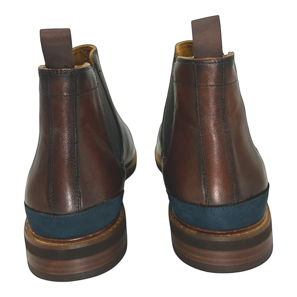 The Shoe Shop Florsheim Highland brown leather Chelsea boots, rear view showing stacked heels and navy blue trim.
