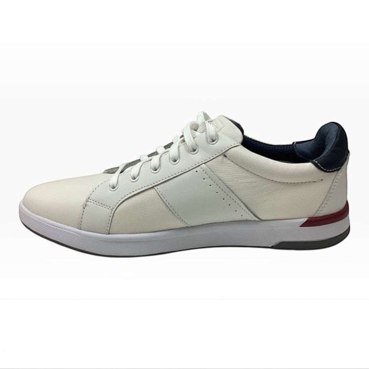 The Shoe Shop Florsheim Crossover white leather lace-up sneaker with a cushioned sole and navy heel detail.