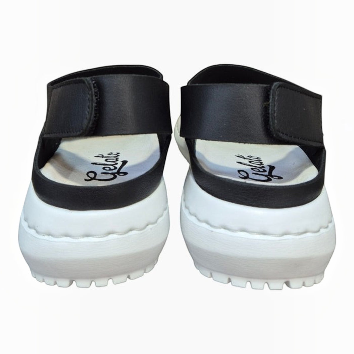 The Shoe Shop Froggo black leather sandals with a white cushioned EVA sole and adjustable velcro strap back view