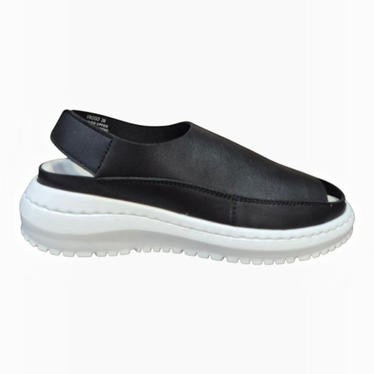 The Shoe Shop Froggo black leather sandal with a white lightweight EVA platform sole and open toe design.