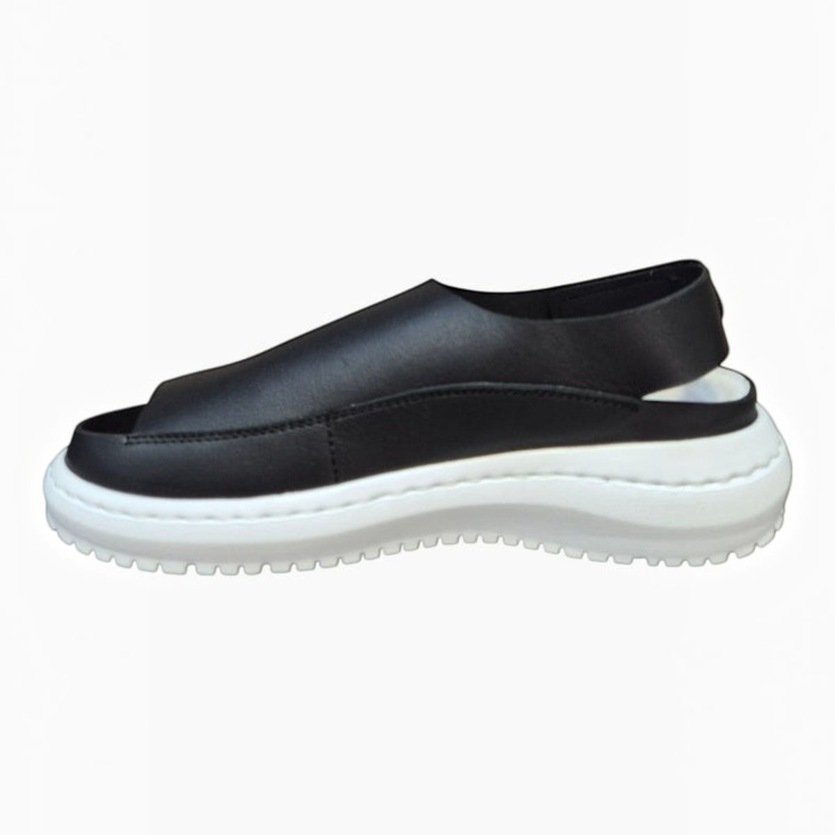 The Shoe Shop Froggo black leather sandal with a white lightweight EVA platform sole, side view.