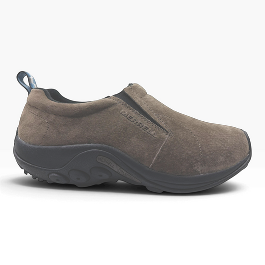 The Shoe Shop Merrell Jungle Moc in fudge brown suede with a durable black rubber sole and slip-on design.