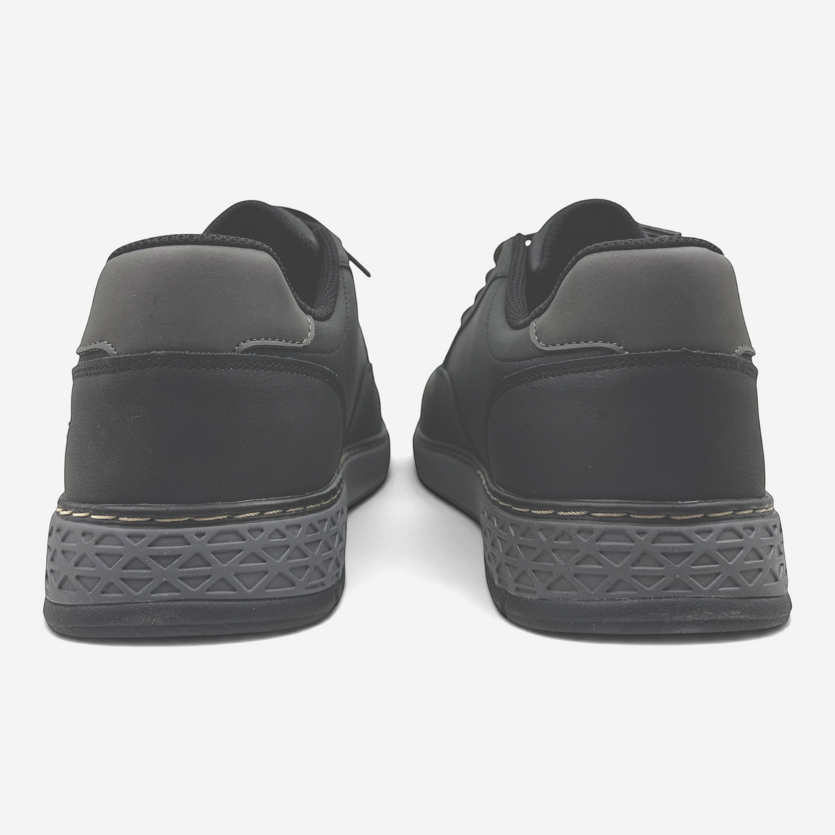The Shoe Shop Garlan Pryor brown waterproof vegan leather shoes, back view showing textured soles and extra wide fit.