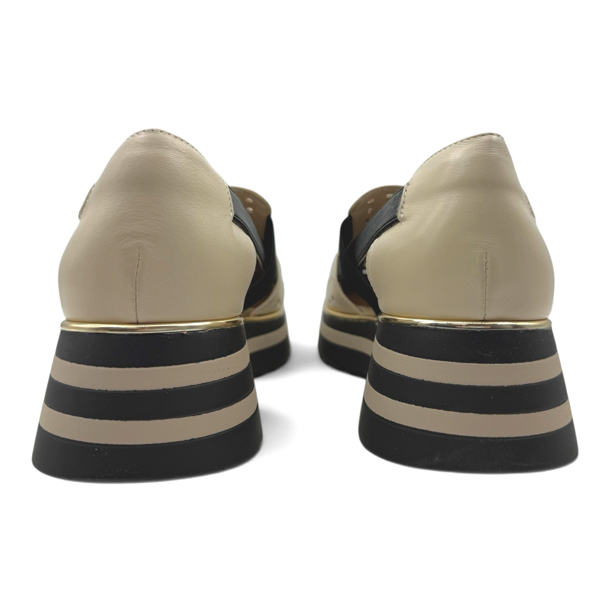The Shoe Shop Gelato GAP slip-on flats in beige and black with a perforated upper and striped platform sole.