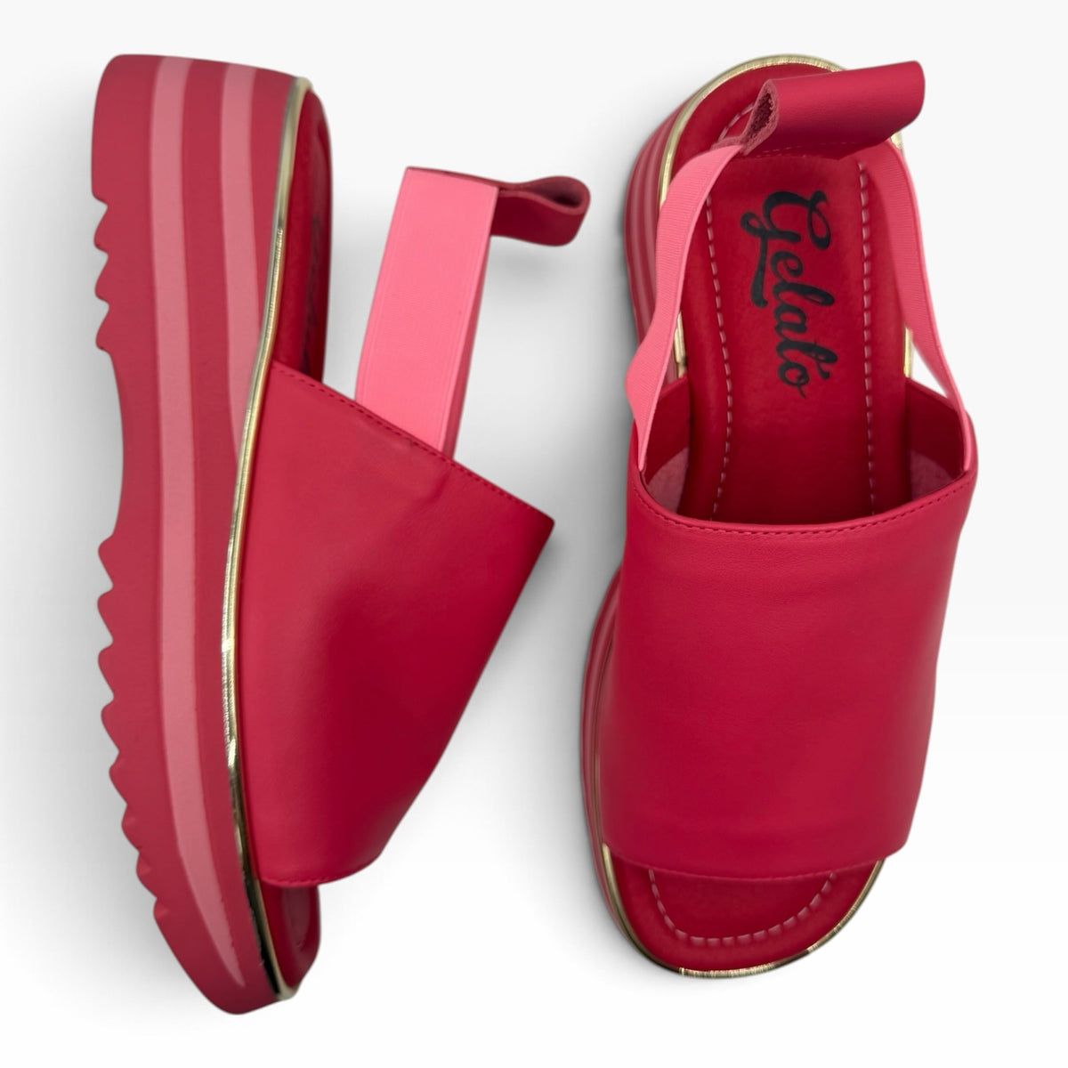 The Shoe Shop Gisborne pink leather platform sandals with elasticated back strap and metallic trim detail.
