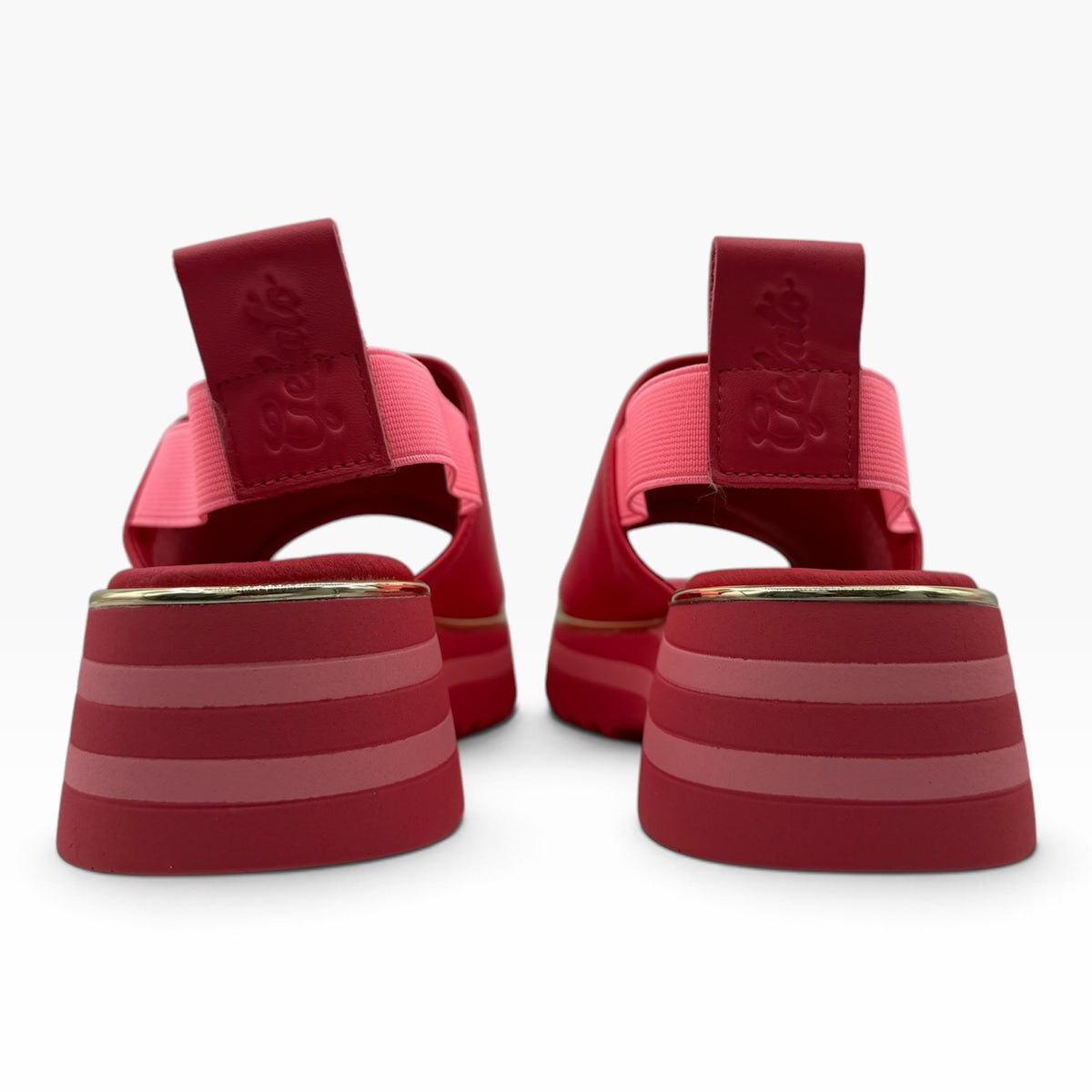 The Shoe Shop Gisborne red leather platform sandals with pink elasticated back straps and metallic trim detail.