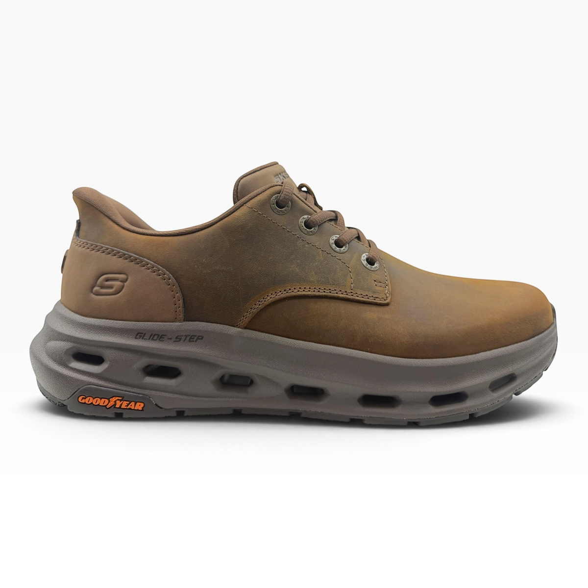 The Shoe Shop Glide Step Cade sneaker in brown leather with a thick, cushioned Goodyear performance outsole.