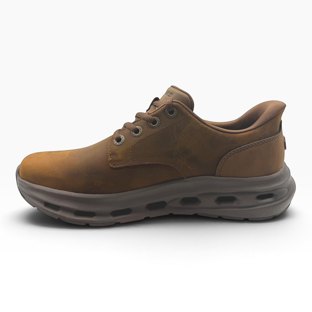 The Shoe Shop Glide Step Cade sneaker in dark brown leather with a thick cushioned sole and lace-up closure
