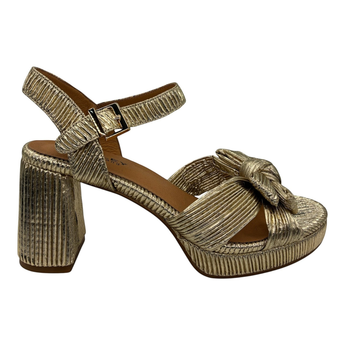 The Shoe Shop Sam gold metallic block heel sandals with a knotted bow detail and adjustable ankle strap
