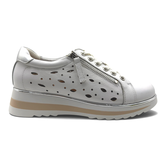 The Shoe Shop Goldie white leather sneaker with laser-cut side details, side zipper, and a metallic platform sole.