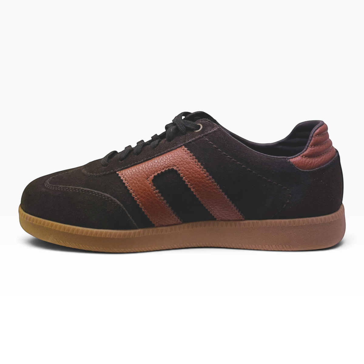 The Shoe Shop Gordon low-top sneaker in dark brown suede with tan leather trim and a classic gum rubber sole.