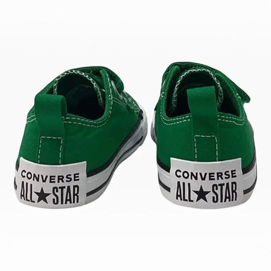 The Shoe Shop green canvas Chuck Taylor All Star sneakers with oversized heel details and pull loops