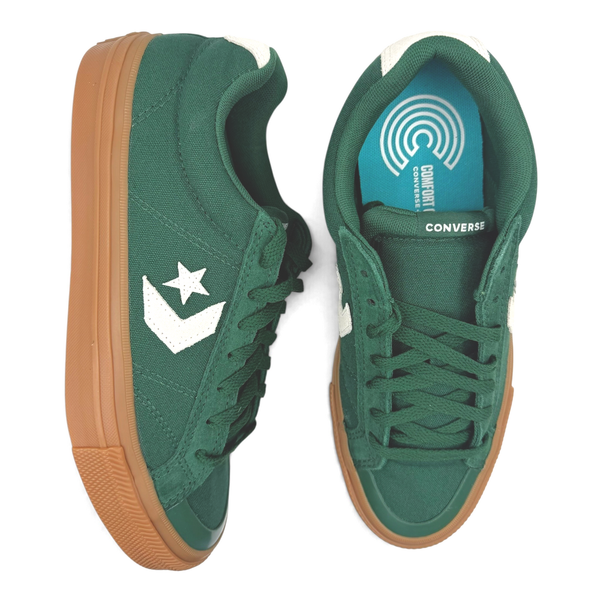 The Shoe Shop Converse green canvas low-top sneakers with gum rubber outsoles and white Star Chevron branding.
