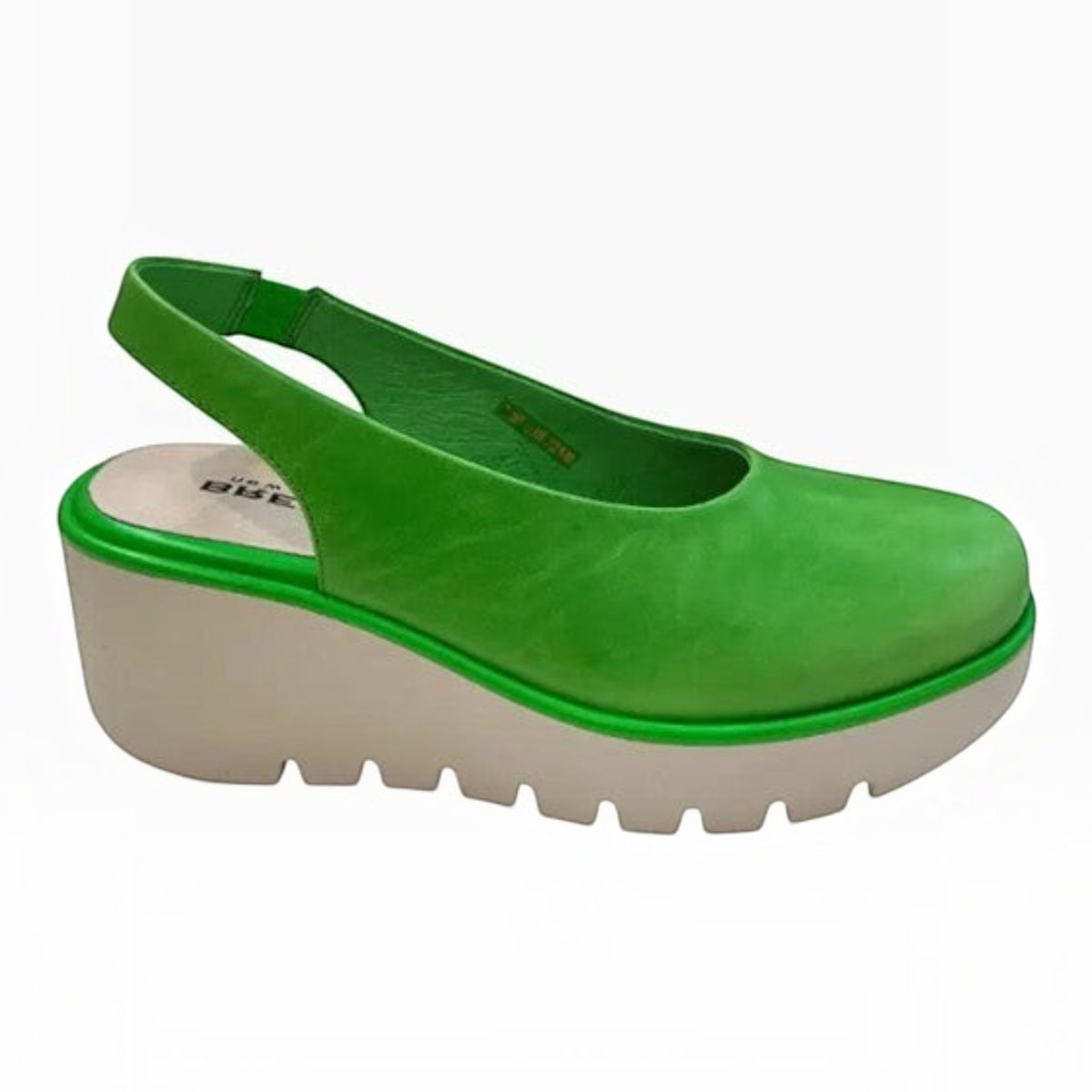 The Shoe Shop Party wedge slingback in vibrant green leather with a thick white rubber lug sole for stability.