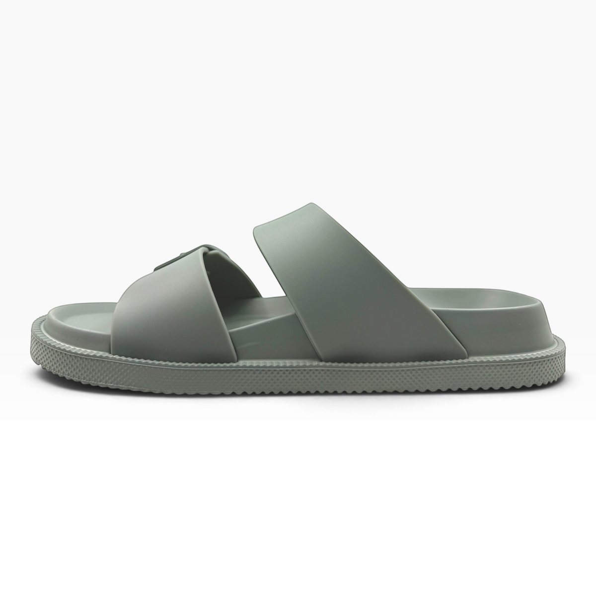 The Shoe Shop Soleseeker green slide sandal with adjustable straps, cushioned footbed, and flexible water-friendly sole.