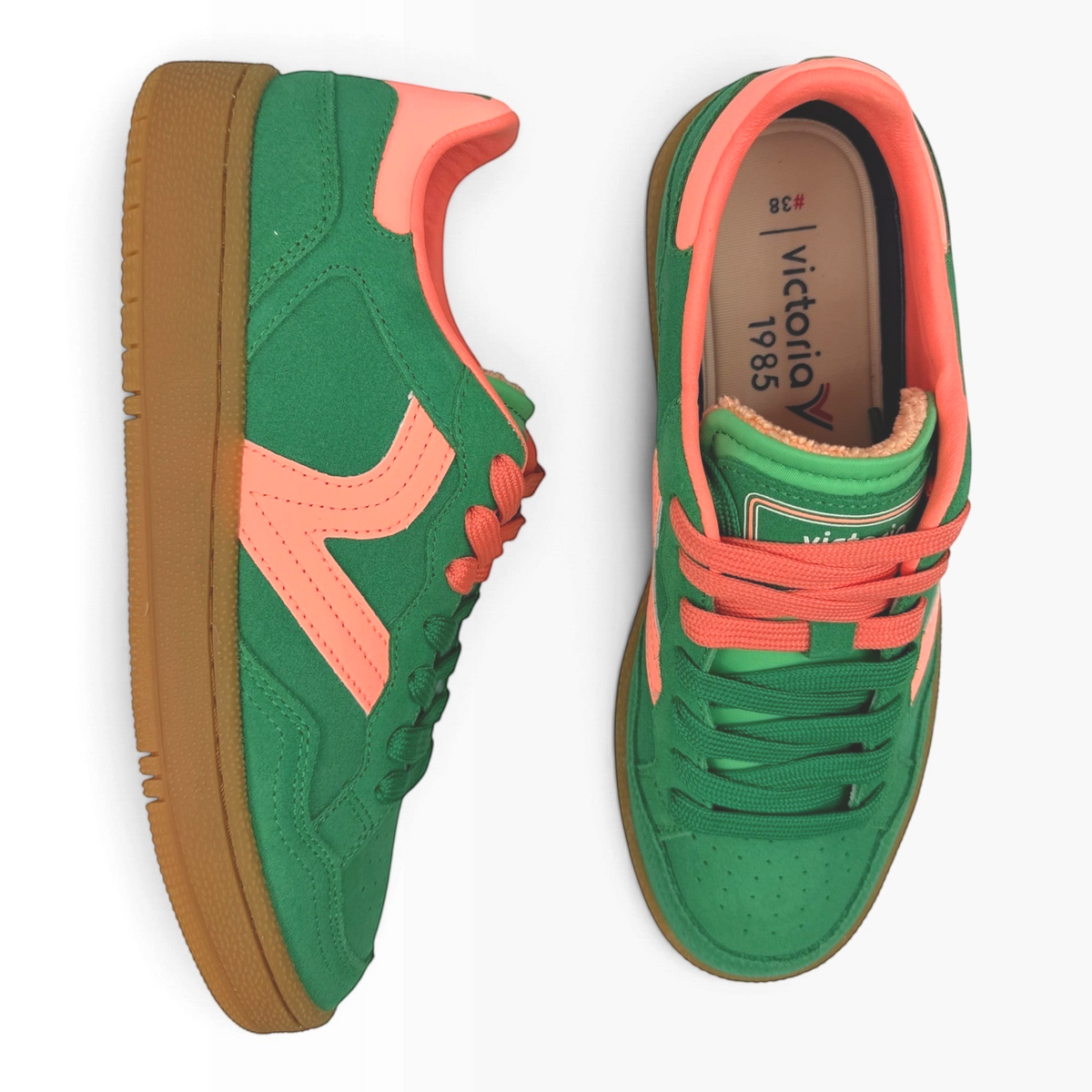The Shoe Shop Smash Sneaker in green suede with coral accents, perforated toe, and classic gum rubber sole.
