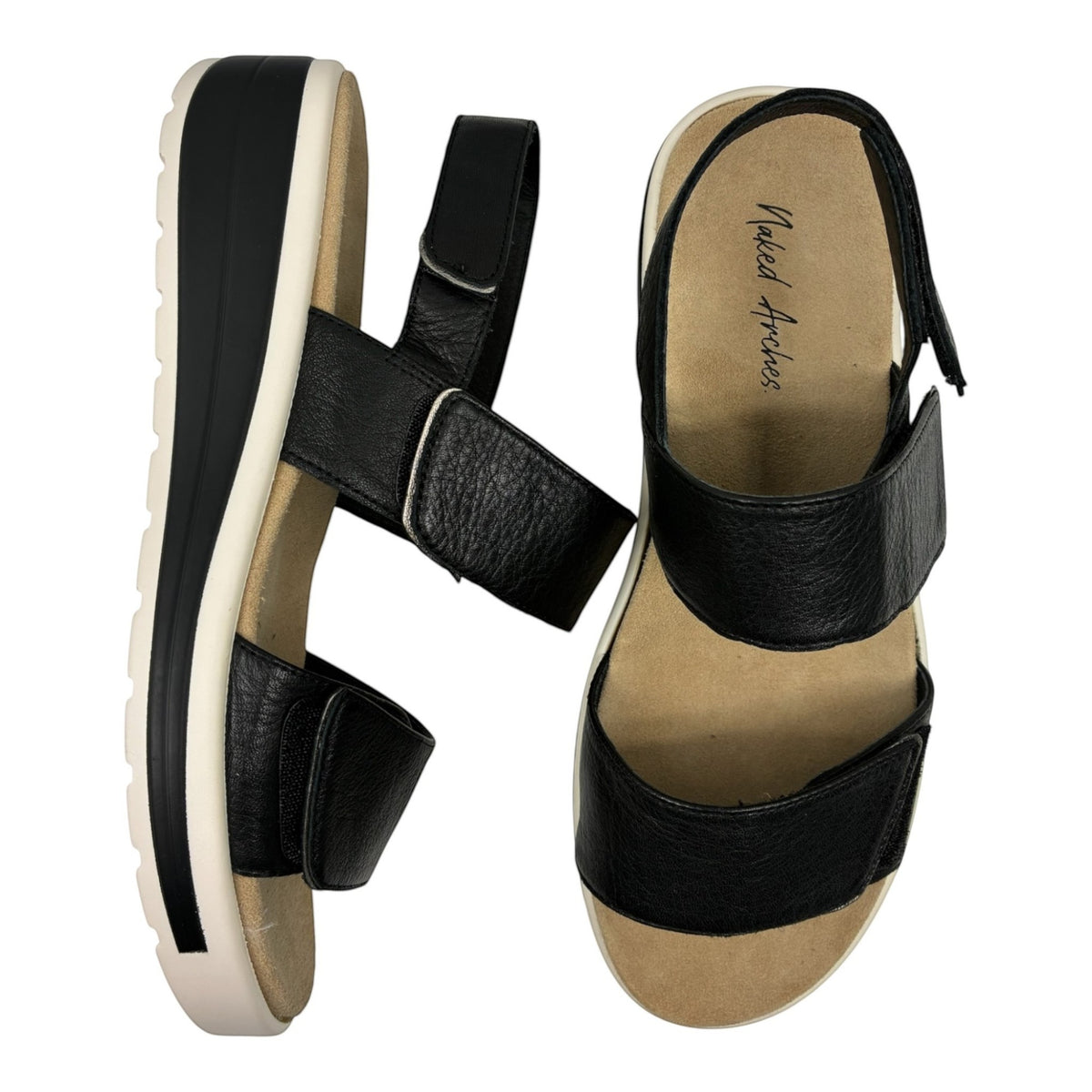 The Shoe Shop Hanza black leather slingback sandals with adjustable straps and cushioned arch support footbed.